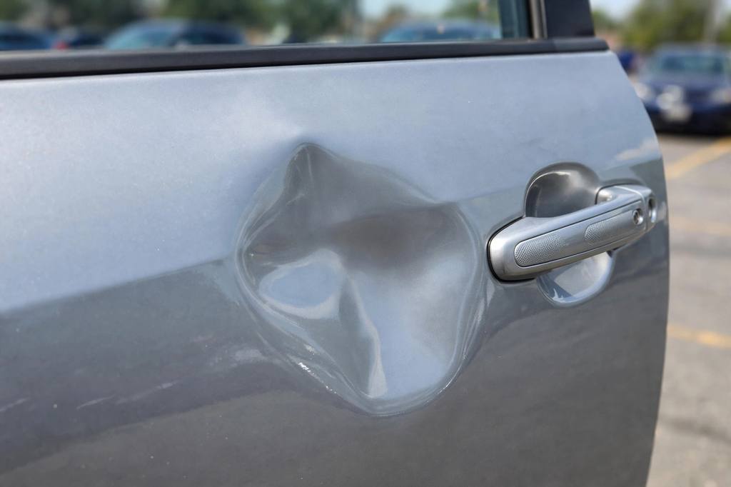 Avant : impacts de grêle sur carrosserie Tesla Model 3